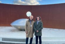 President of the Association of Flight PS752 Families standing beside of a Member of Board of Director of MH17 Association at the MH17 Memorial site in Netherlands