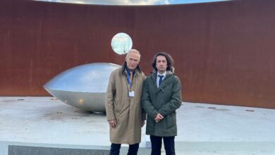 President of the Association of Flight PS752 Families standing beside of a Member of Board of Director of MH17 Association at the MH17 Memorial site in Netherlands