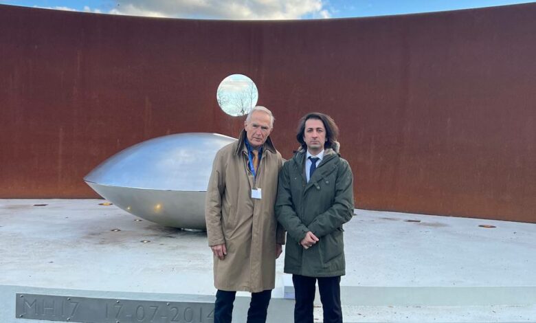 President of the Association of Flight PS752 Families standing beside of a Member of Board of Director of MH17 Association at the MH17 Memorial site in Netherlands