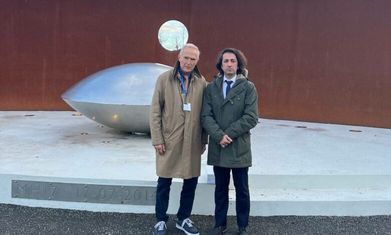 President of the Association of Flight PS752 Families standing beside of a Member of Board of Director of MH17 Association at the MH17 Memorial site in Netherlands